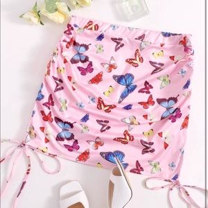 NWOT ruched butterfly mini skirt